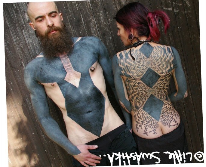 Outstanding Artists: Little Swastika – Tribal inspired group tattoos – on multiple backs