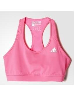 Sports bra in pink by Adidas