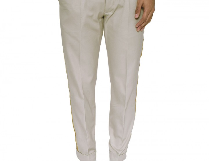 Chino in sand with metal thread applications in gold